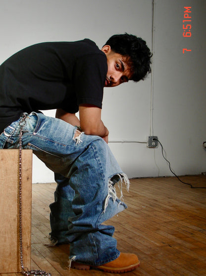 “SEA TURF”                               DISTRESSED JEANS